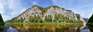 Ural Mountains with lake reflection